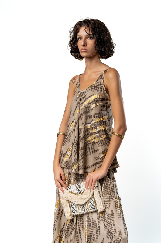 Fabric detail of an airy, comfortable women's top.