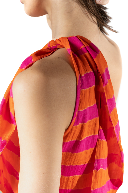 Detail of the shoulder knot in the orange and fuchsia stripe print fabric.