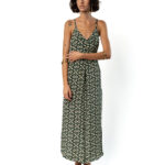 Front view of green and beige wide-leg jumpsuit with V-neckline and belted waist.
