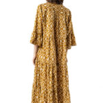 Back view of mustard yellow boho maxi dress with tiered skirt and wide sleeves, geometric patterned fabric